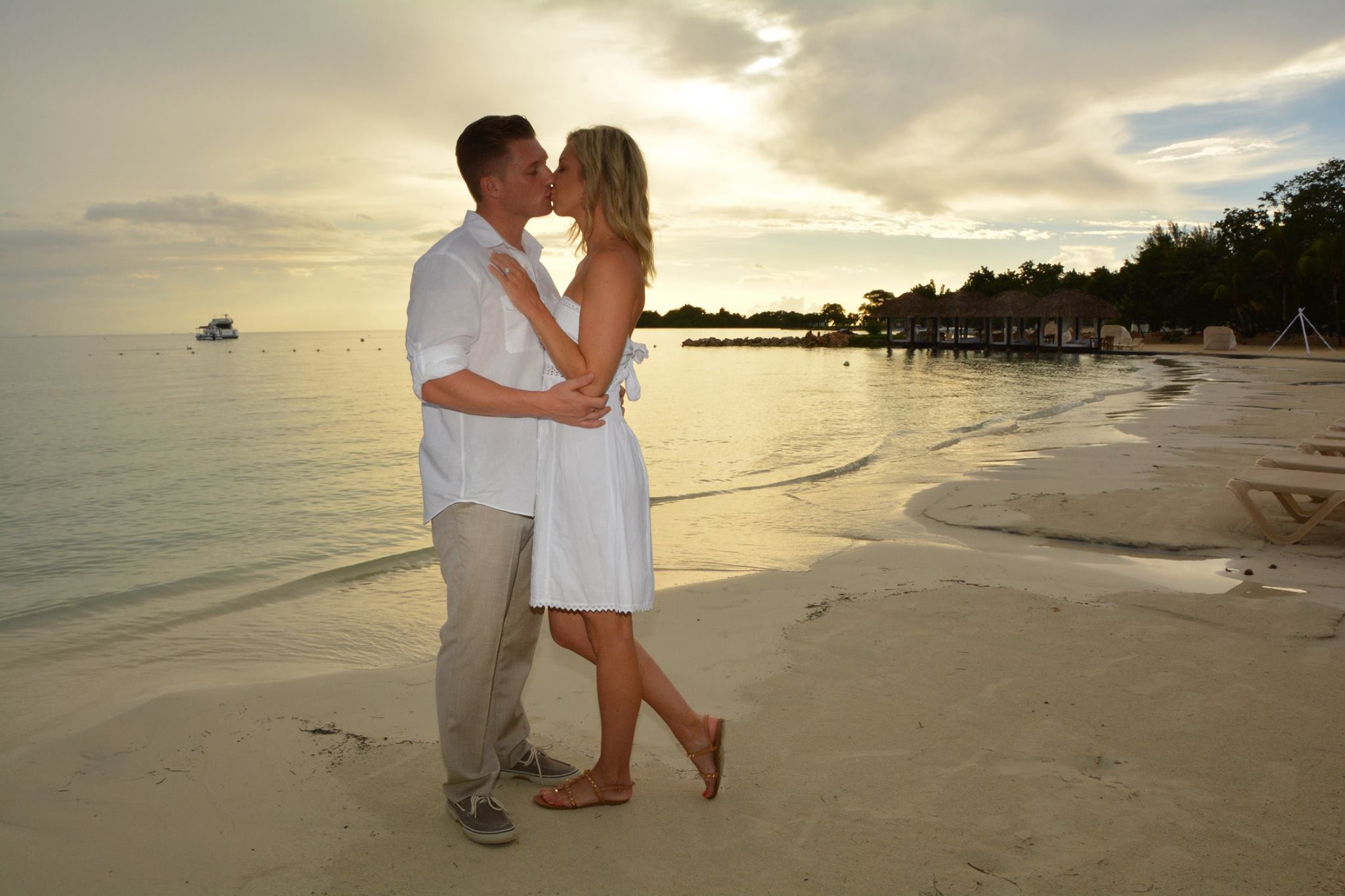 Couple on beach spray tan denver mexico vacation
